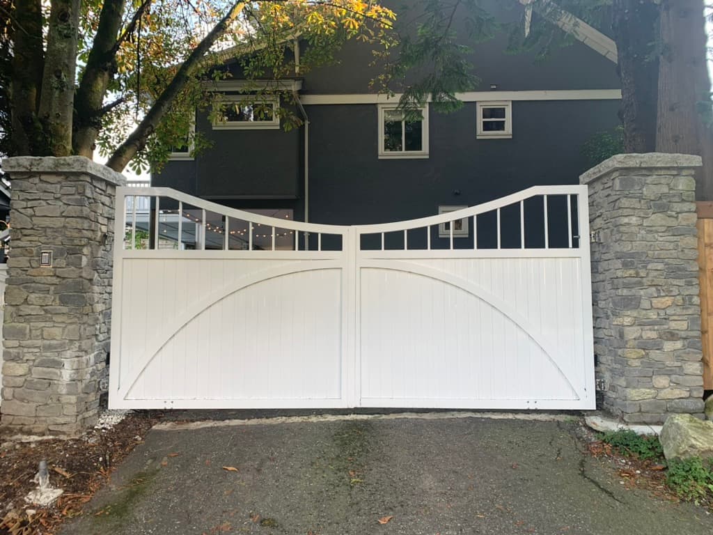 Wrought iron style railing along an outdoor walkway