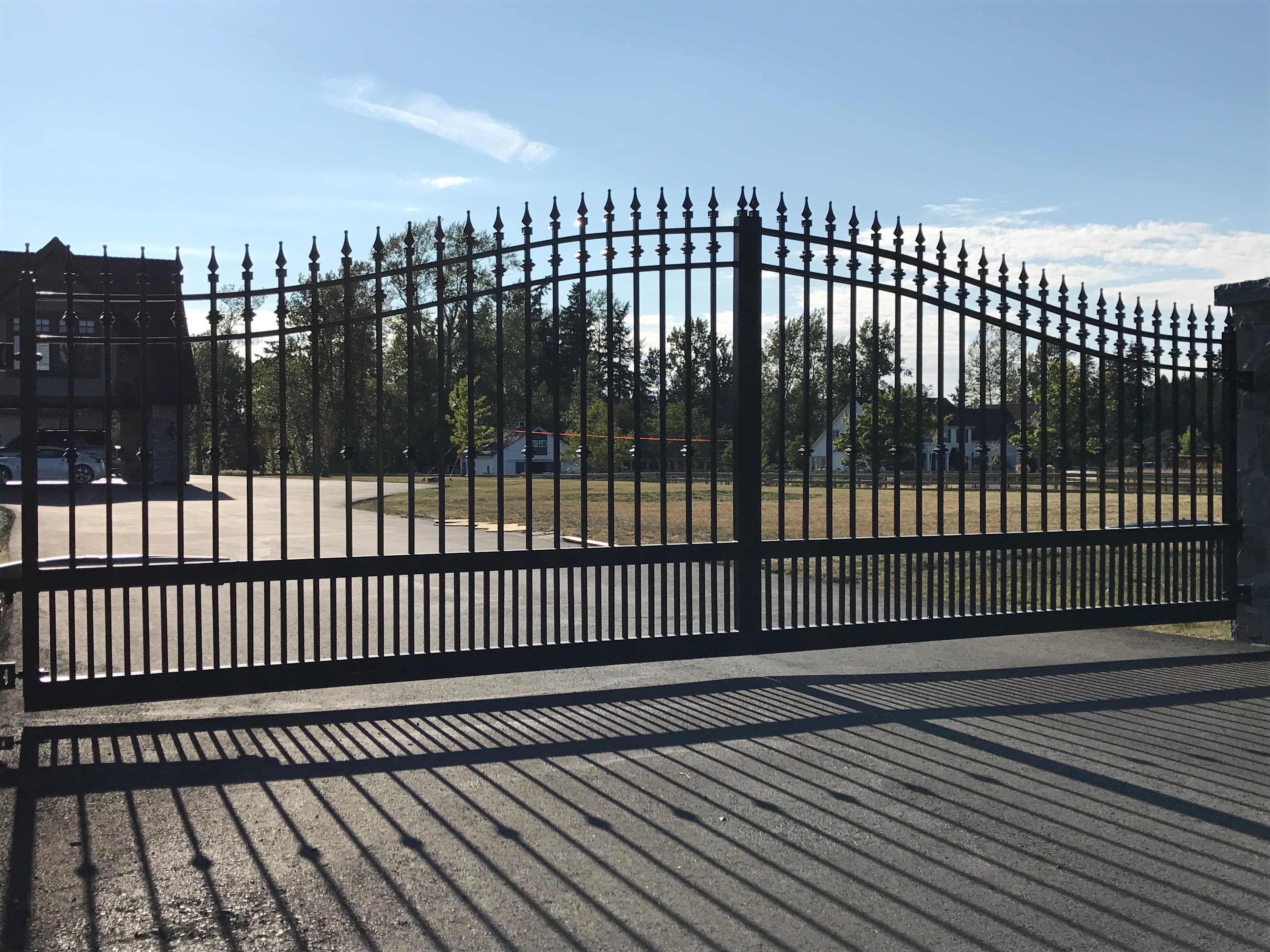 Black spear-top double swing gate and fence