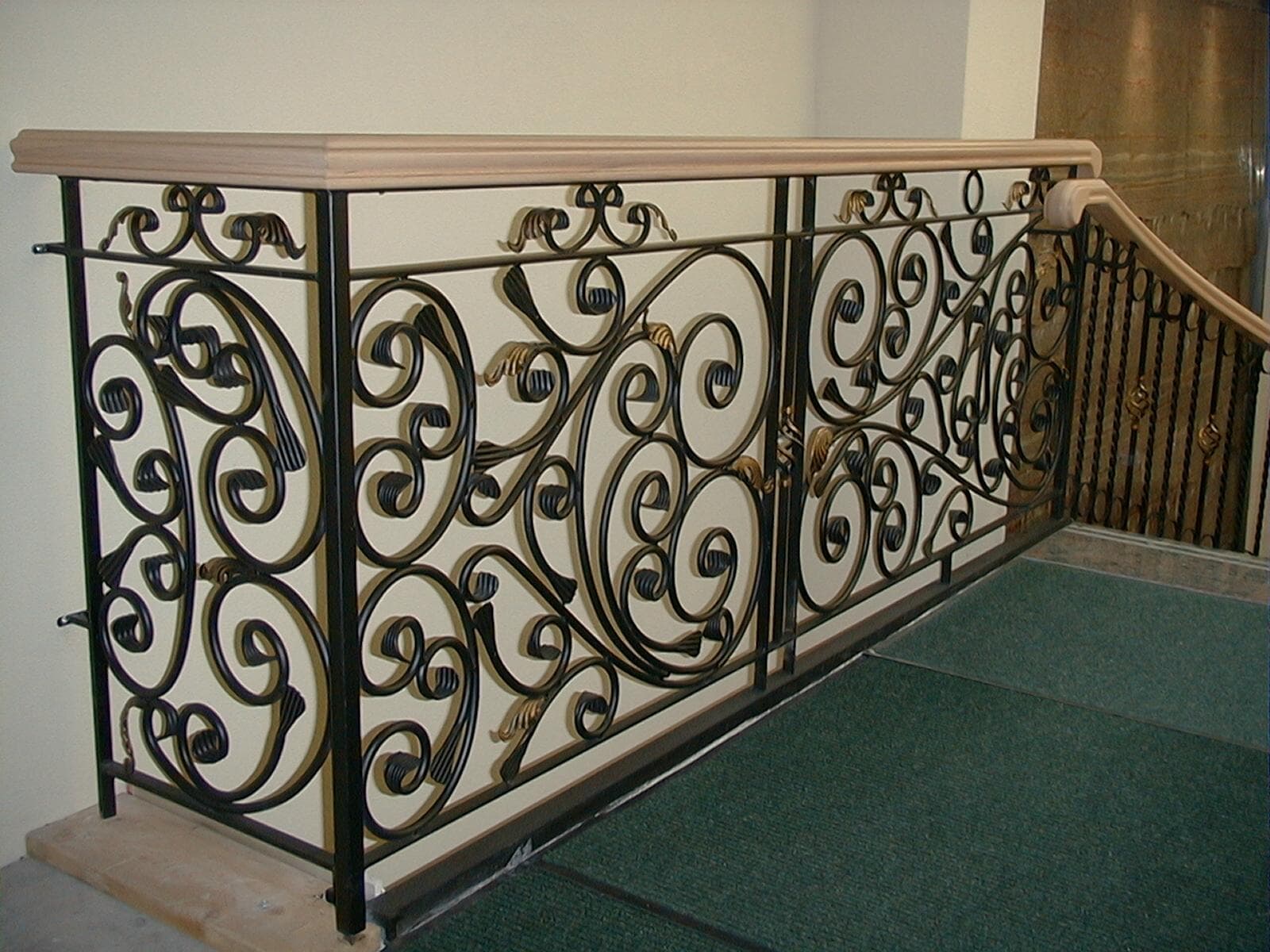 Indoor stair railing with metal balusters