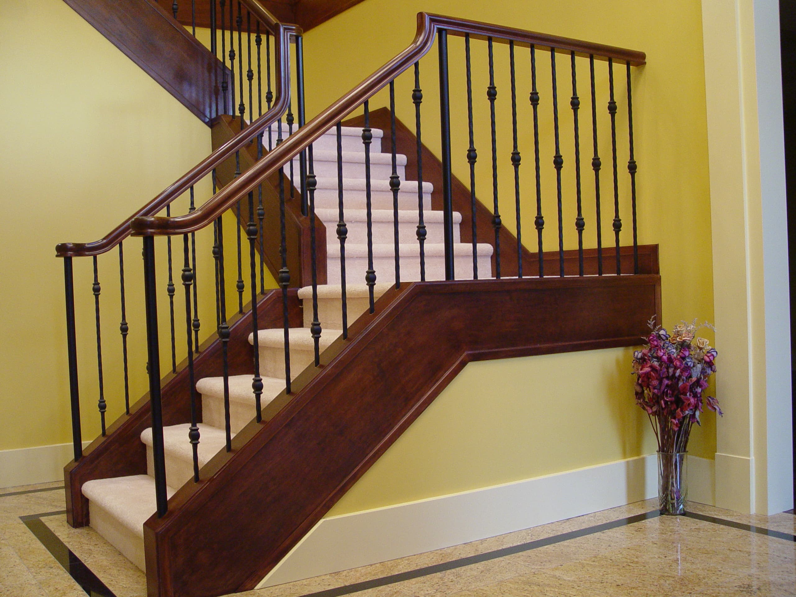 Indoor stair railing with metal balusters